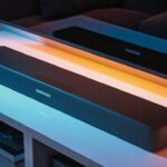 Illustration of discounted soundbars from top brands like Samsung, Sony, and Sonos during Prime Day (AI-generated, non-realistic illustration). Credit: Ideogram.